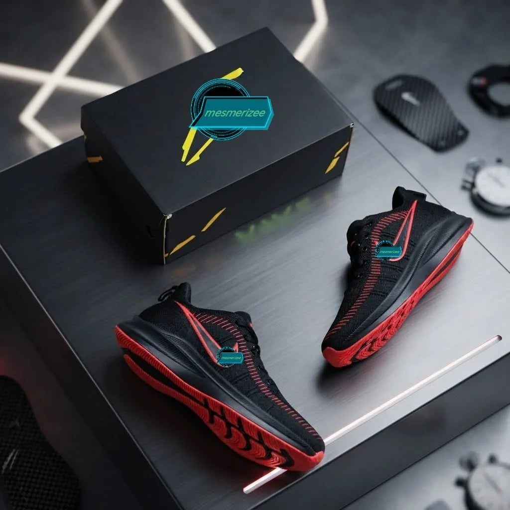 Mesmerizee black premium running mesh sneakers with red soles on a dark surface.