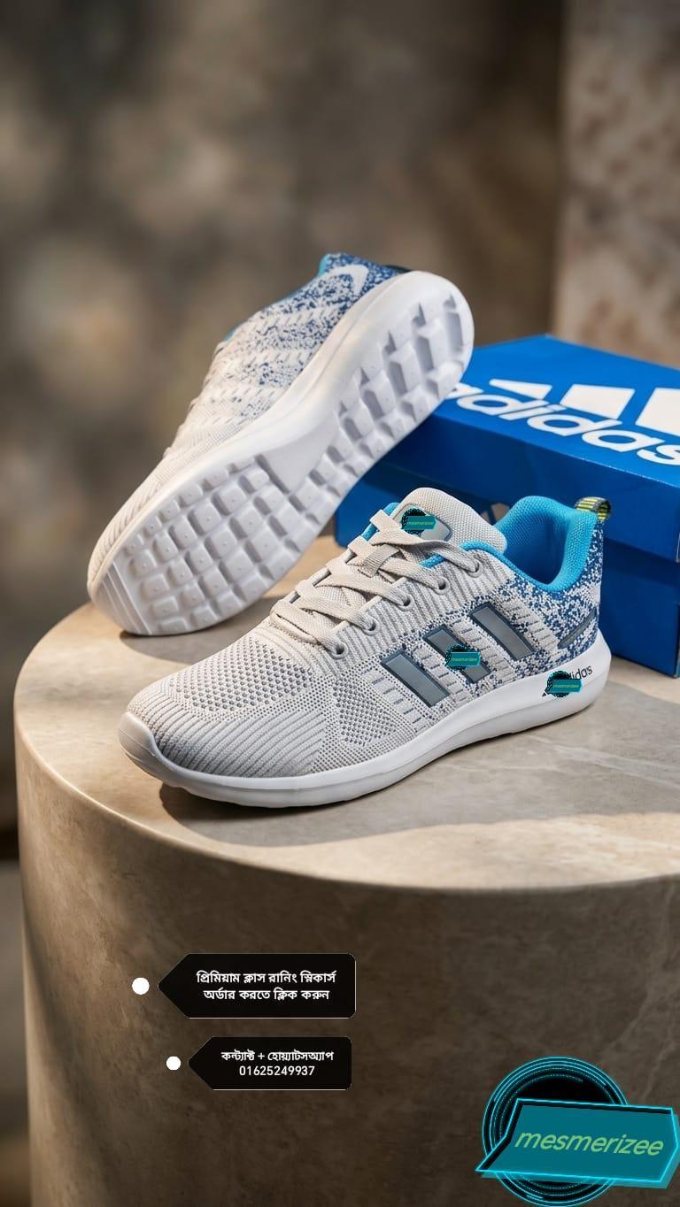 Mesmerizee light grey premium running mesh sneakers for men with blue accents.