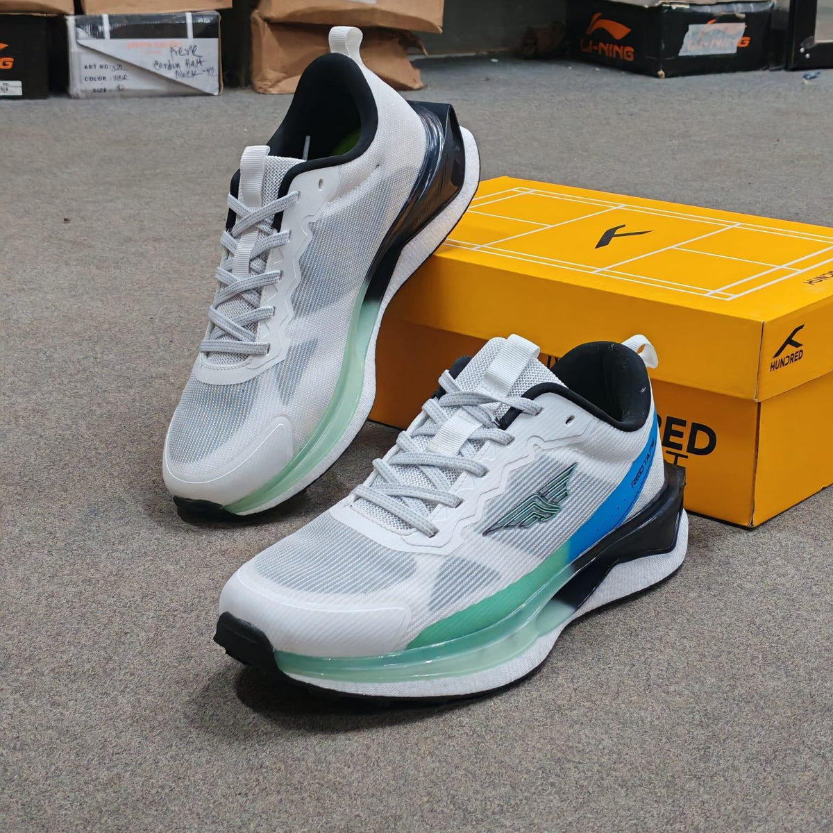 Mesmerizeecom Ultra-Comfort Premium Running Mesh Sneakers for Men in white with blue accents