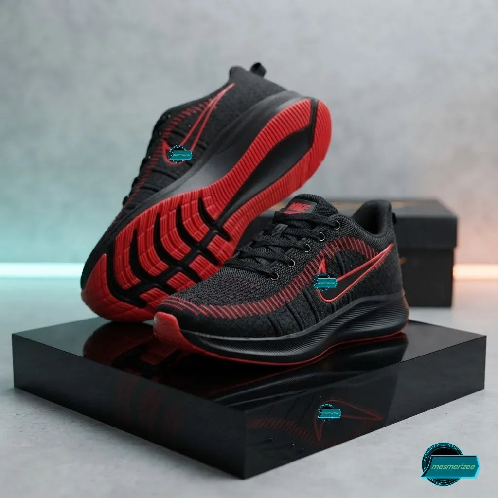 Mesmerizee black and red premium running mesh sneakers for men on a black pedestal.