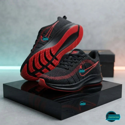 Mesmerizee black and red premium running mesh sneakers for men on a black pedestal.