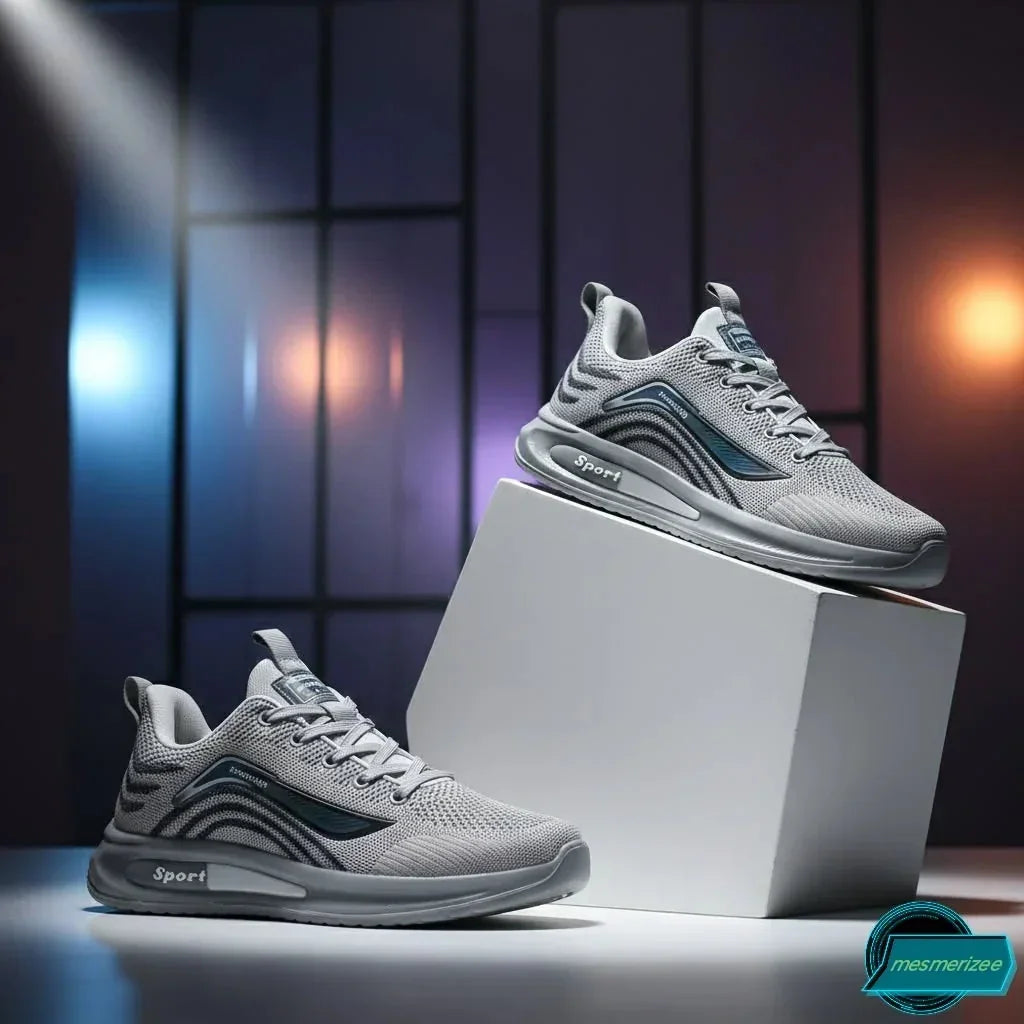 Grey premium running mesh sneakers for men by Mesmerizeecom on white pedestals.